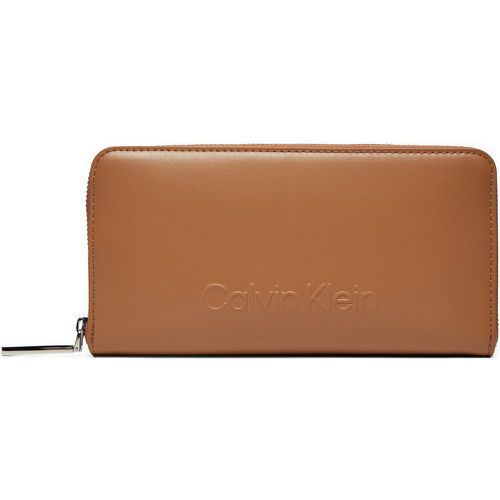 Portafoglio grande da donna Embossed Logo Zip Lg Wallet K60K612439 - Calvin Klein - Modalova