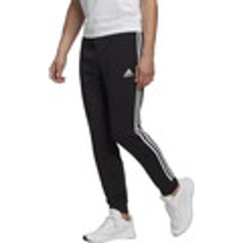 Pantaloni Essentials French Terry Tapered Cuff 3-Stripes - Adidas - Modalova