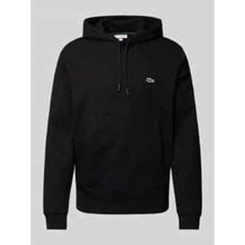 Regular Fit Hoodie mit Baumwolle - Lacoste - Modalova