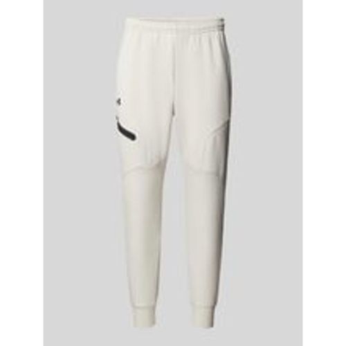 Regular Fit Sweatpants mit Reißverschlusstasche Modell 'UNSTOPPABLE' - Under Armour - Modalova