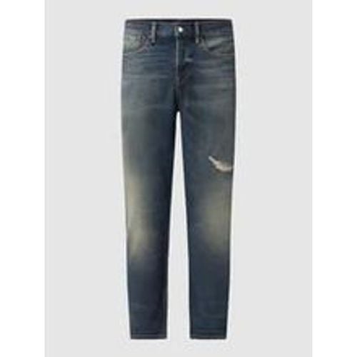 Losse Tapered Fit Jeans aus Baumwolle Modell 'Dean' - Scotch & Soda - Modalova