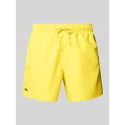 Regular Fit Badeshorts mit Logo-Badge - Lacoste - Modalova