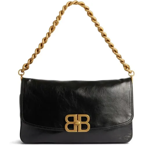 Schwarze Weiche Tasche mit Goldakzenten - Balenciaga - Modalova