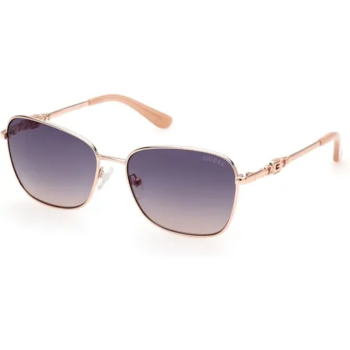 Elegant Butterfly Sunglasses with Rose Gold Frame and Blue Gradient Lenses , female, Sizes: 57 MM - Guess - Modalova