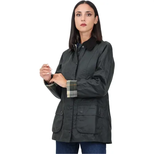 Grüne Wasserdichte Jacke für Frauen , Damen, Größe: L - Barbour - Modalova