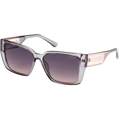 Grau Rosa/Grau Getönte Sonnenbrille , unisex, Größe: 56 MM - Guess - Modalova