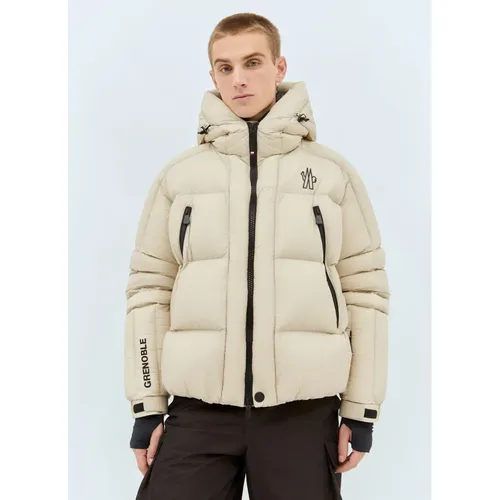 Gepolsterte Daunenjacke mit verlängerten Bündchen - Moncler - Modalova