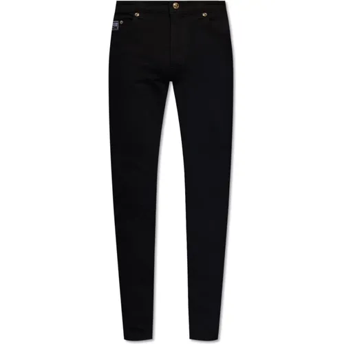 Jeans mit schmal zulaufenden Beinen , Herren, Größe: W29 - Versace Jeans Couture - Modalova