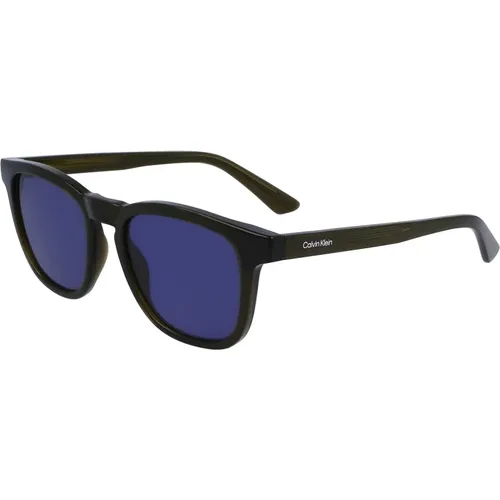 Schwarze/Blaue Sonnenbrille,Schwarze/Graue Sonnenbrille,Dunkelbraune/Blaue Sonnenbrille,Transparente/braune Sonnenbrille - Calvin Klein - Modalova