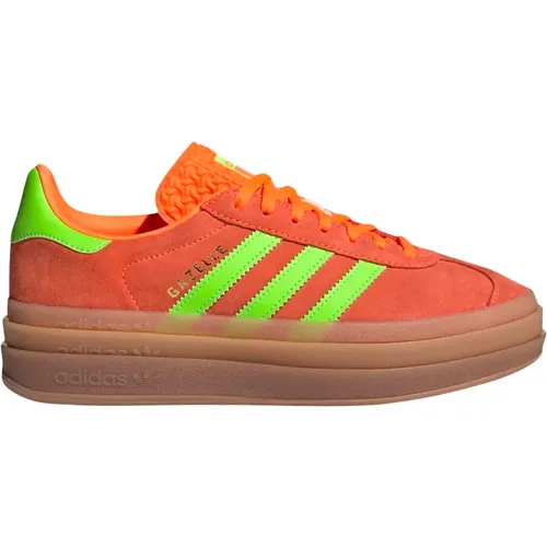 Mutige Solar Orange Grüne Sneakers , Herren, Größe: 42 EU - Adidas - Modalova