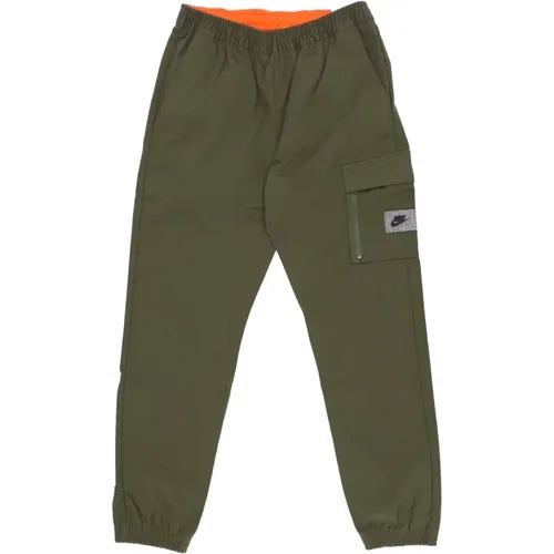 Sportbekleidung Gewebte Hose Grün/Orange/Schwarz , Herren, Größe: XL - Nike - Modalova