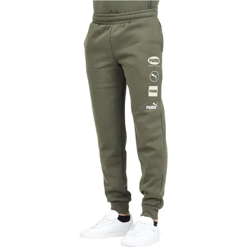 Sportliche Grüne Hose PUMA - Puma - Modalova