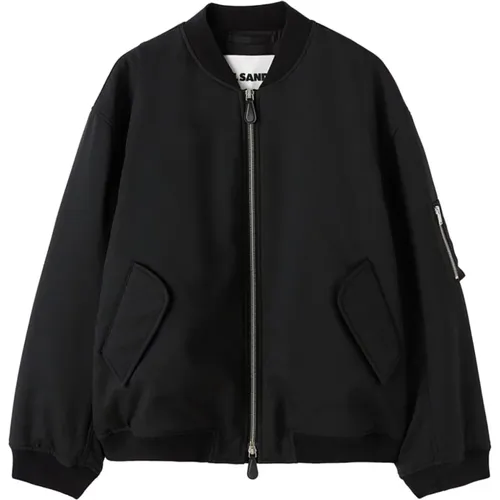 Schwarzer Mantel aus recyceltem Polyester mit Rippbündchen,Coats - Jil Sander - Modalova