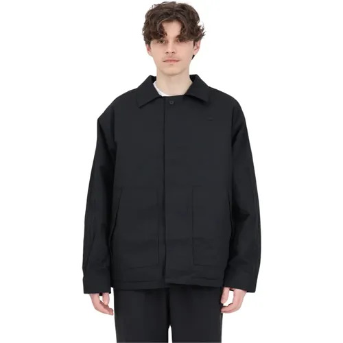 Schwarze Jacke mit geripptem Kragen und Knopfverschluss - adidas Originals - Modalova