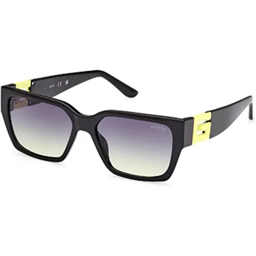 Stilvolle gelbe Sonnenbrille mit grauen Gläsern , unisex, Größe: 55 MM - Guess - Modalova