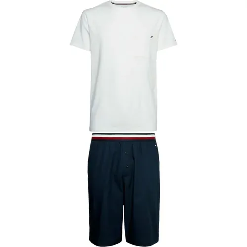 Der elastische Bund der Shorts erinnert an das ikonische Detail, das das T-Shirt schmückt und einen koordinierten Lounge-Look mit makellosem Stil sch - Tommy Hilfiger - Modalova