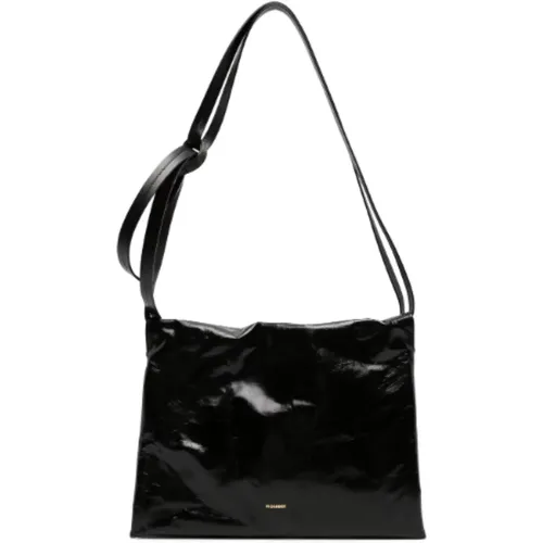 Shoulder Bags,Schwarze Leder-Schultertasche mit Kontrast-Logo - Jil Sander - Modalova