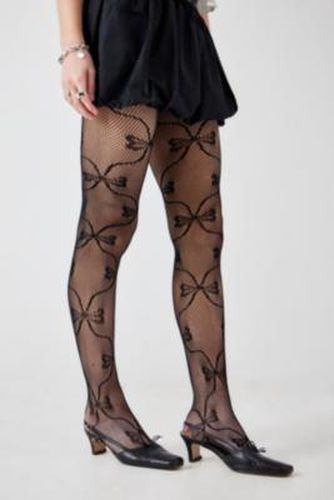 Bow Fishnet Tights - at Urban Outfitters - Out From Under - Modalova