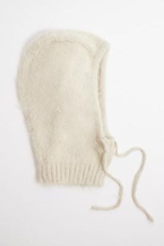 UO Kody Fluffy Knitted Hood - Cream at - Urban Outfitters - Modalova