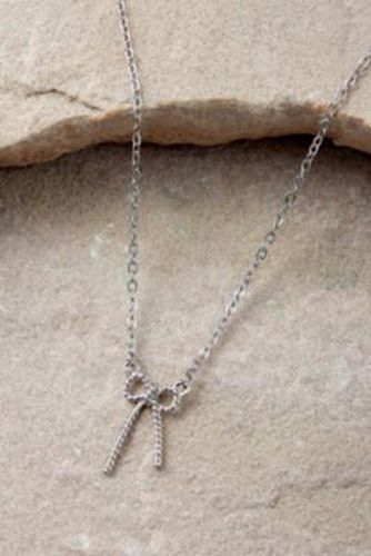 Bow Necklace - Silver at Urban Outfitters - Silence + Noise - Modalova
