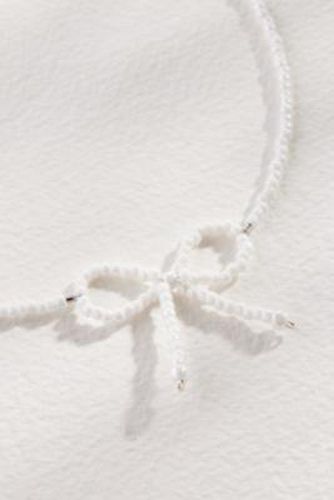 Glass Bead Bow Choker Necklace at Urban Outfitters - Rhimani - Modalova