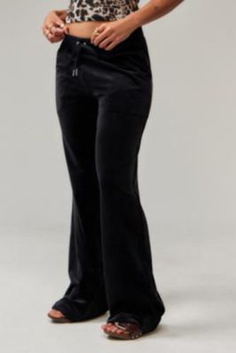 Black Low-Rise Velour Flare Track Pants - Black XS at Urban Outfitters - Juicy Couture - Modalova