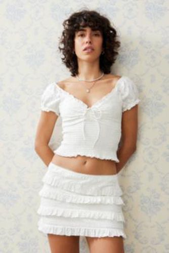 UO Kira Broderie Mini Skirt - White 2XS at - Urban Outfitters - Modalova