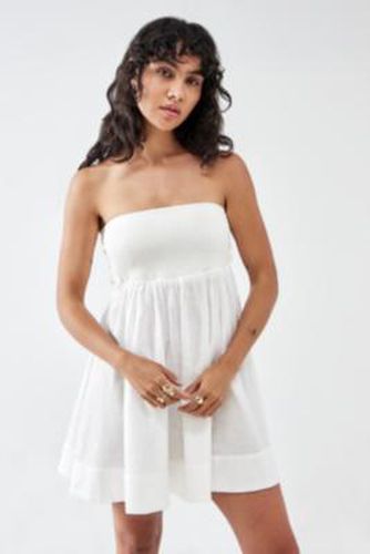 Aurora White Smocked Mini Dress - Ivory 2XS at Urban Outfitters - BDG - Modalova