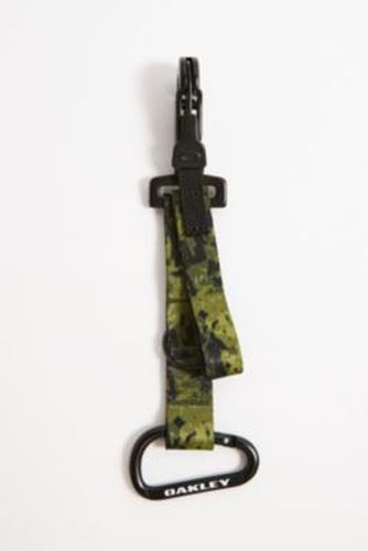 Wanderlust Keychain - Green at Urban Outfitters - Oakley - Modalova