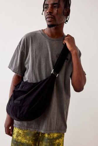 Black Tech Pocket Sling Bag - Black at Urban Outfitters - BDG - Modalova