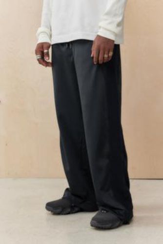 UO Exclusive Blackout Wide-Leg Track Pants - S at Urban Outfitters - Oakley - Modalova