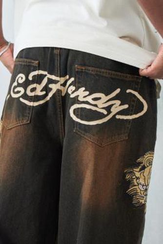 UO Exclusive Brown Tinted Denim Dragon Jeans - Brown 32W 30L at Urban Outfitters - Ed Hardy - Modalova