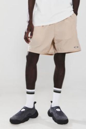 UO Exclusive Hummus Metallic Shorts - Neutral S at Urban Outfitters - Oakley - Modalova