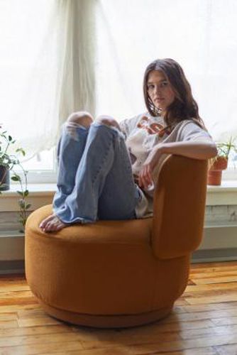 Amaia Mustard Swivel Chair - Orange L: 86.5cm x W: 83cm x H: 75cm at - Urban Outfitters - Modalova