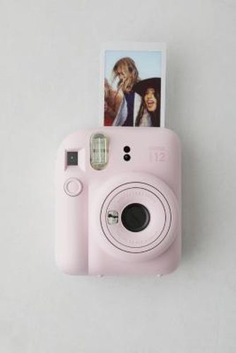 Instax Mini 12 Pink Instant Camera - Pink 11.9cm x 7.5cm x 15.7cm at Urban Outfitters - Fujifilm - Modalova