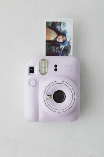 Instax Mini 12 Lilac Instant Camera - Lilac 11.9cm x 7.5cm x 15.7cm at Urban Outfitters - Fujifilm - Modalova
