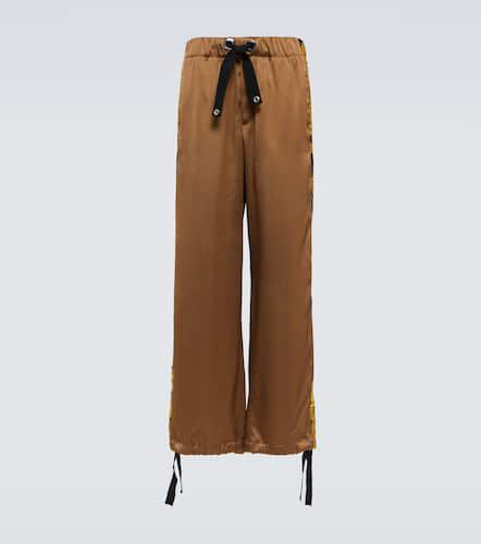 Pantalones de satén brillante con lazos - Versace - Modalova
