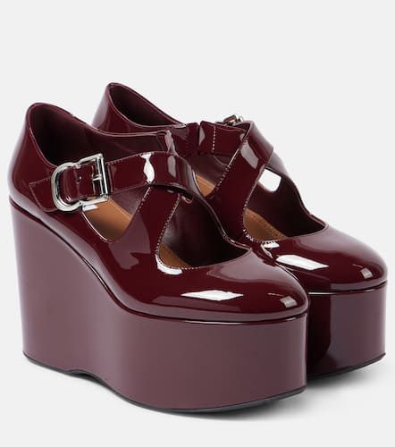 Alaïa Pumps Criss Cross 110 in vernice con zeppa - Alaia - Modalova