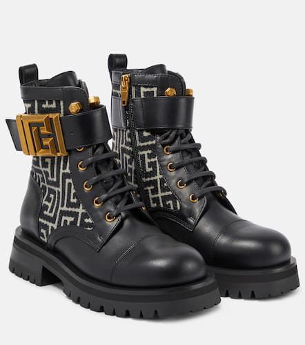 Charlie monogram leather combat boots - Balmain - Modalova