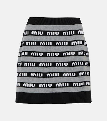 Logo jacquard wool miniskirt - Miu Miu - Modalova