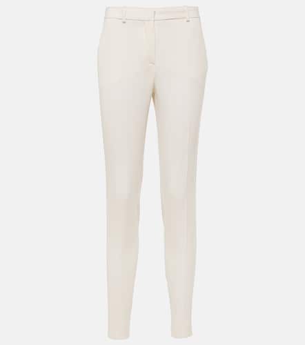 Pantalones slim de lana de tiro alto - Versace - Modalova