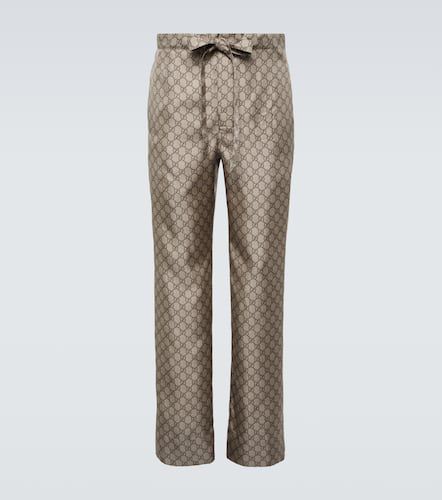 Pantalones rectos de seda con GG - Gucci - Modalova