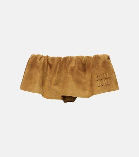 Logo low-rise suede miniskirt - Miu Miu - Modalova