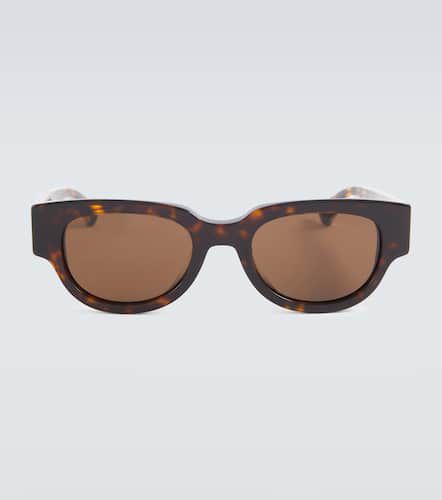 Tortoiseshell oval sunglasses - Bottega Veneta - Modalova