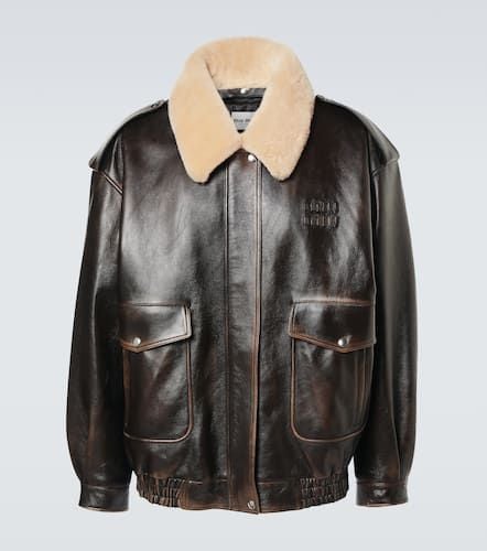 Shearling-trimmed leather bomber jacket - Miu Miu - Modalova