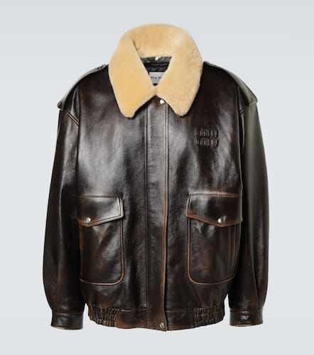 Shearling-trimmed leather jacket - Miu Miu - Modalova