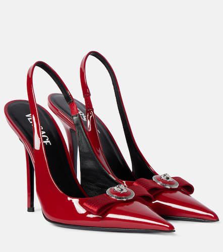 Gianni patent leather slingback pumps - Versace - Modalova