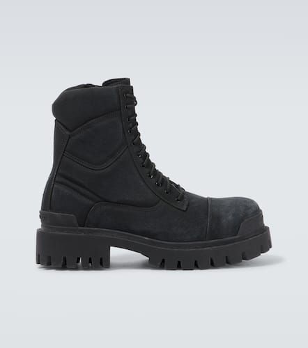 Botas con cordones Combat Strike de lona - Balenciaga - Modalova