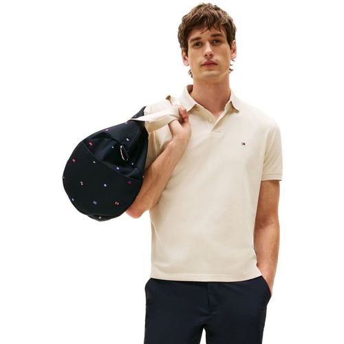 T-shirt MW0MW17770 RBT REG POLO-ACG NEWSPRINT - Tommy Hilfiger - Modalova