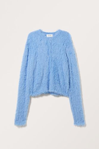 Flauschige Strickjacke - Blau - Monki - Modalova